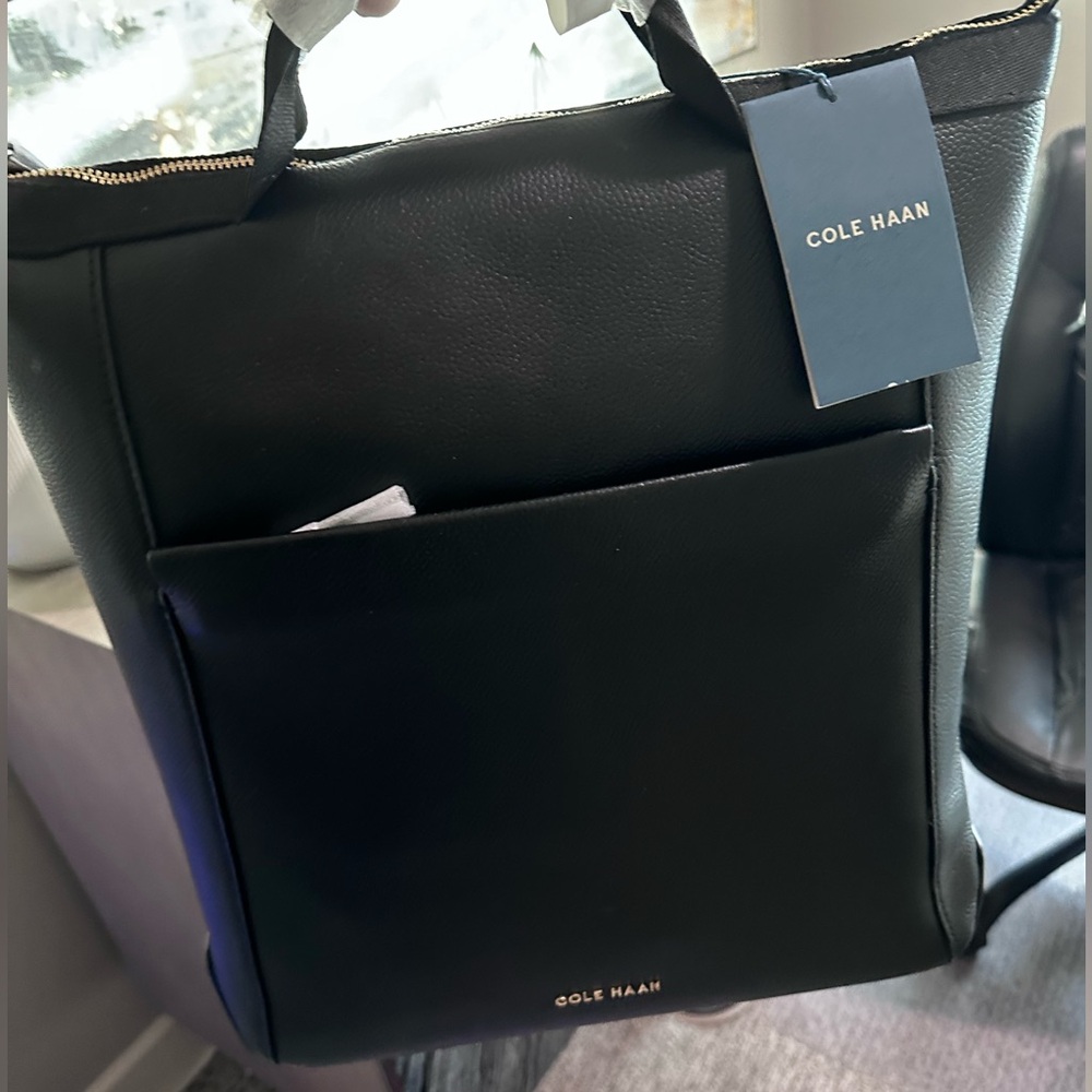 Cole Haan Grand Ambition messenger backpack, black & gold
